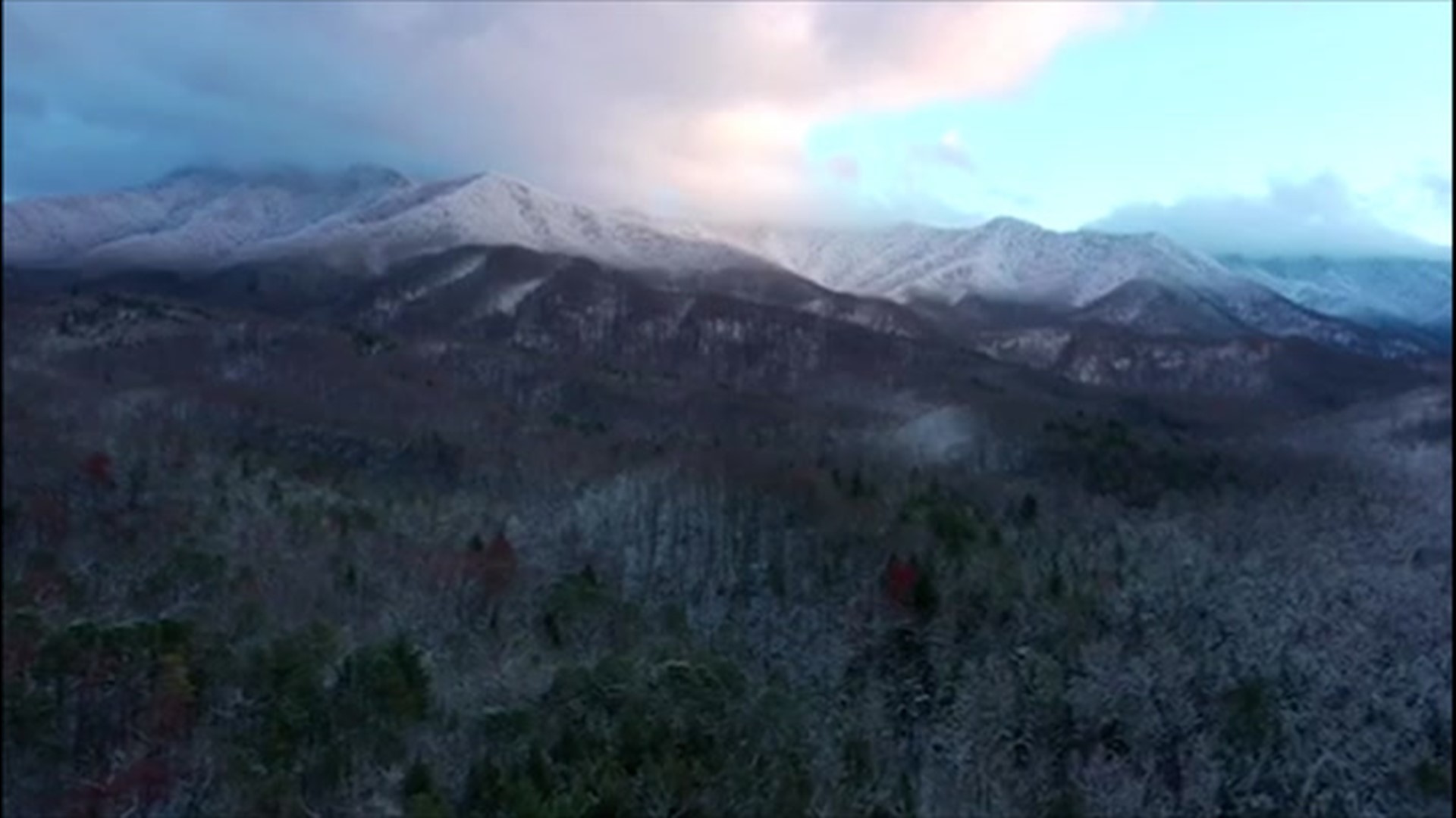 Enjoy these gorgeous drone shots of a snowy sunset over the Great Smoky Mountains from Pittman Center, Tennessee, on Dec. 1.