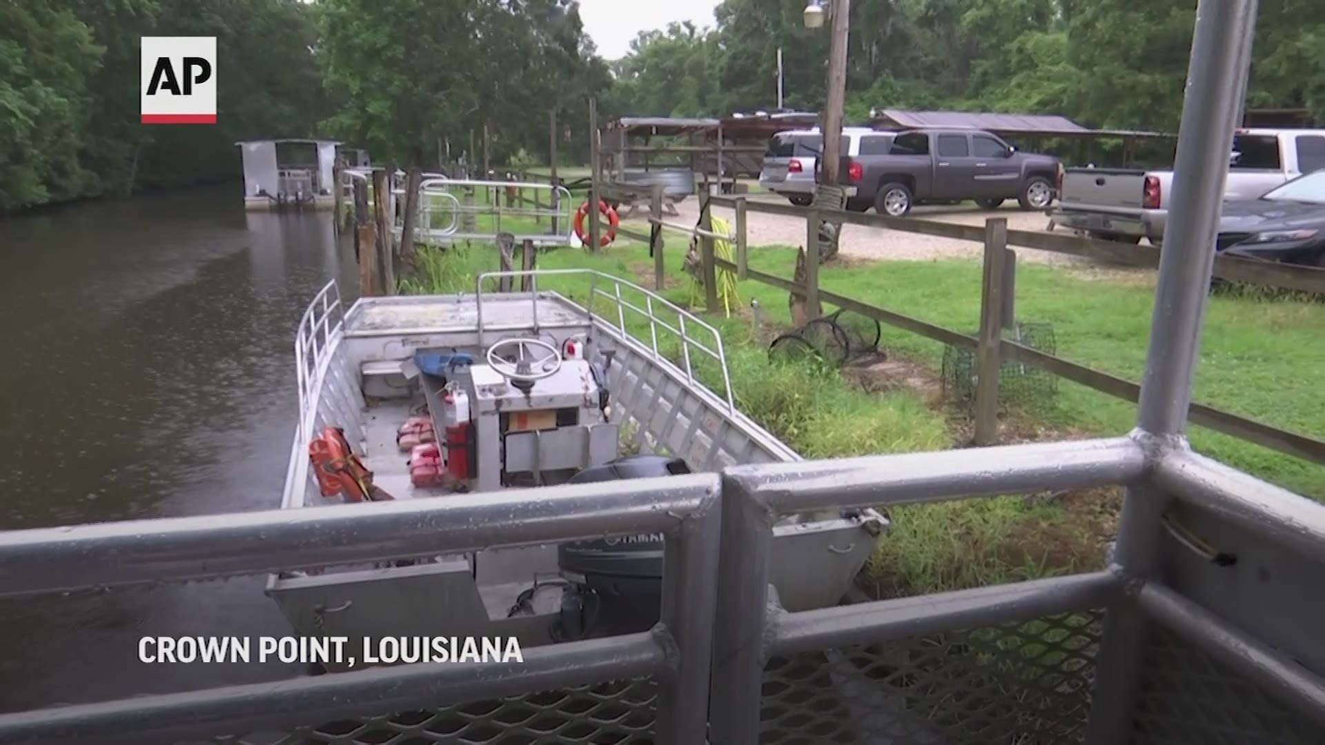 Authorities in Alabama say a suspected tornado spurred by Tropical Storm Claudette demolished or badly damaged at least 50 homes in a small town near Florida.