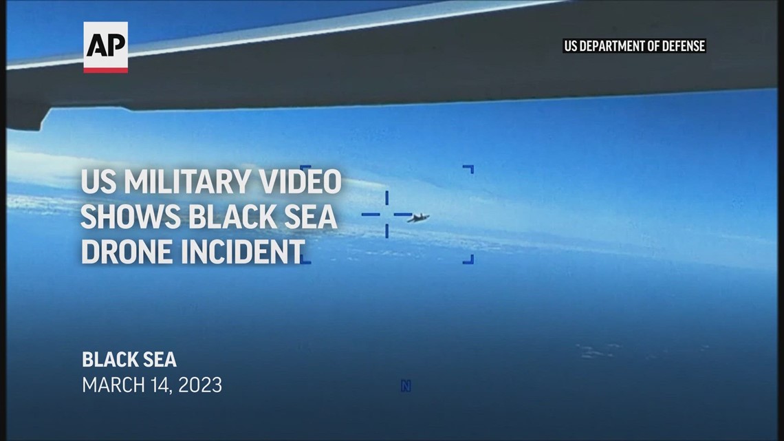US military video shows Russian jet dumping fuel on drone over Black Sea