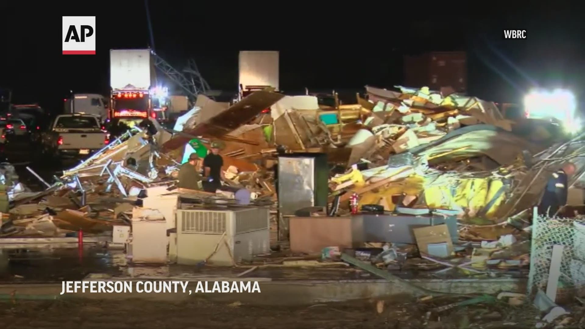 A tornado tore through an Alabama city north of Birmingham Monday night, leaving one person dead and the area with crumpled buildings and downed trees.