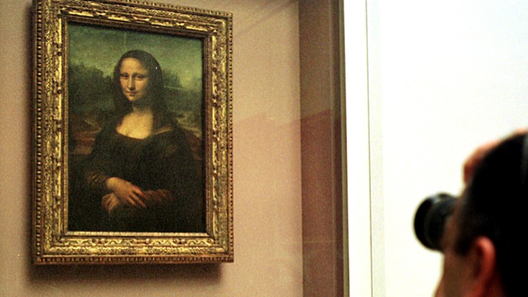 Mona Lisa Attacked in Louvre With Cake By Man Wearing Wig