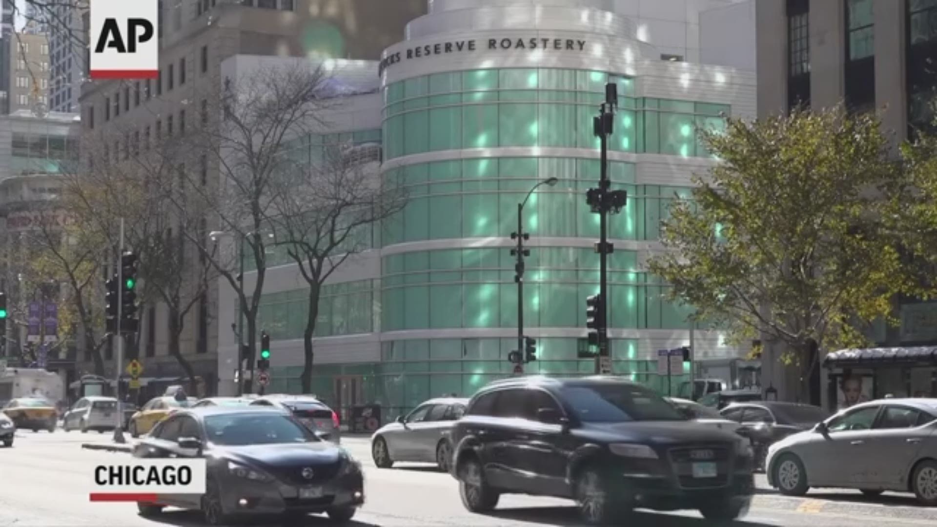 Starbucks is opening a high-end roastery in Chicago on Friday, and they say it is the largest Starbucks in the world. (AP)