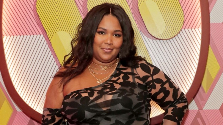Lizzo shows off her curvaceous behind in a VERY revealing thong