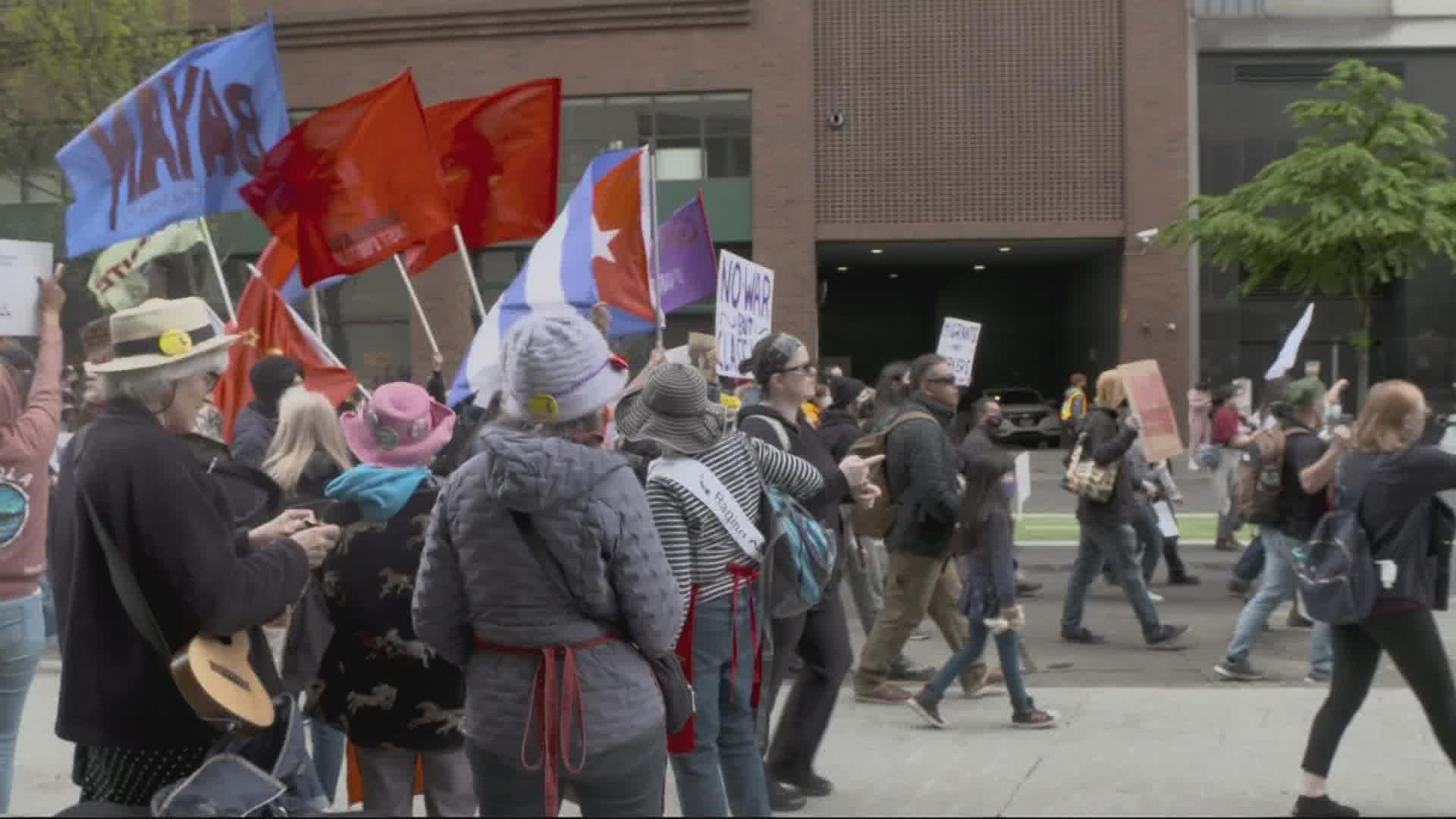 Protesters rallied in Portland on May Day in support of unions at some of the Northwest's biggest corporations. KGW's Galen Ettlin reports.