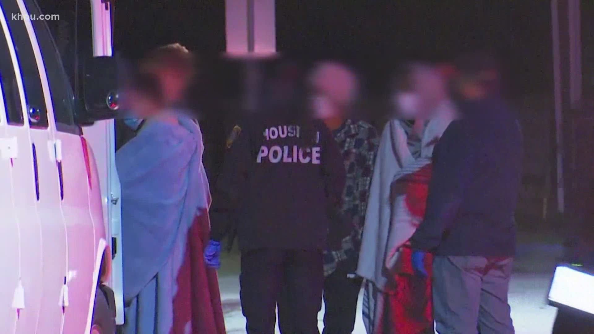 More than two dozen people were found inside a southwest Houston home on Thursday night — held hostage in just their underwear, police said.