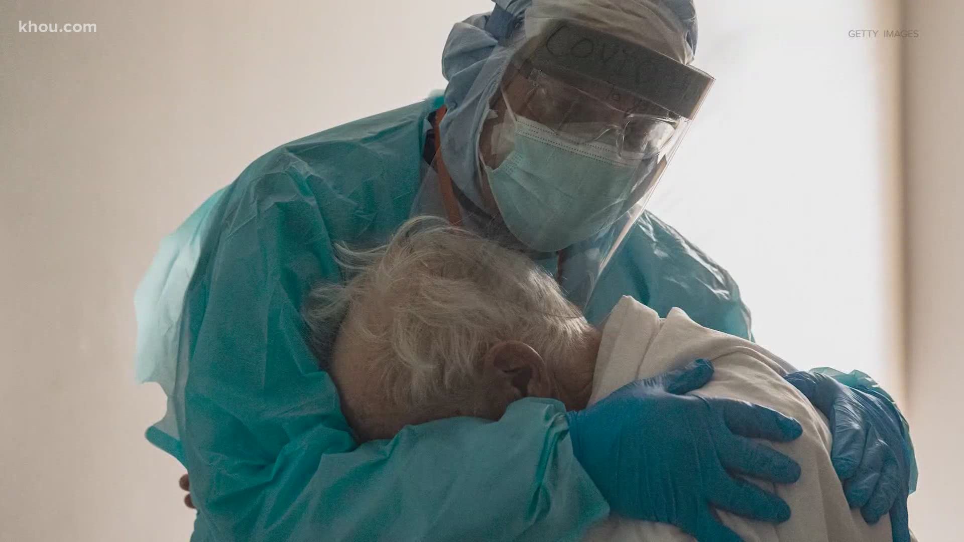 Houston Dr. Joseph Varon's gentle embrace of a distraught patient was captured in a now viral photo by photographer Go Nakamura.