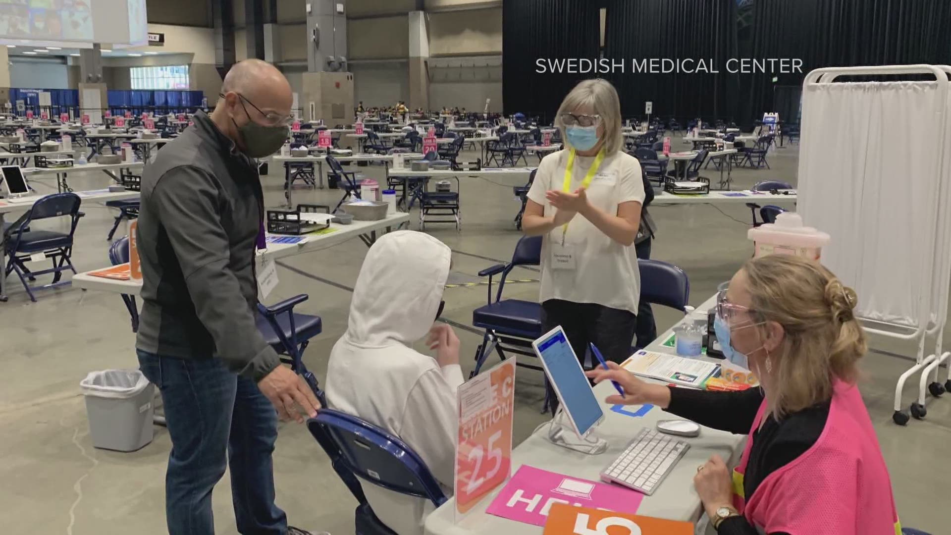 Todd Abraham is a professional test pilot for Boeing, but spends his free time volunteering at Lumen Field with the largest civilian-run vaccine clinic in the U.S.