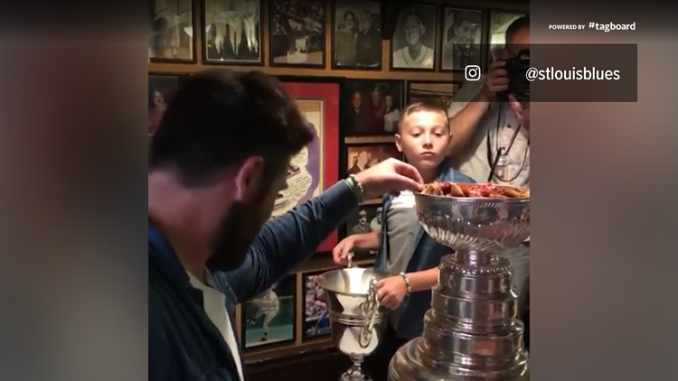 Pat Maroon, Laila Anderson eat toasted ravioli out of the Cup | www.neverfullmm.com