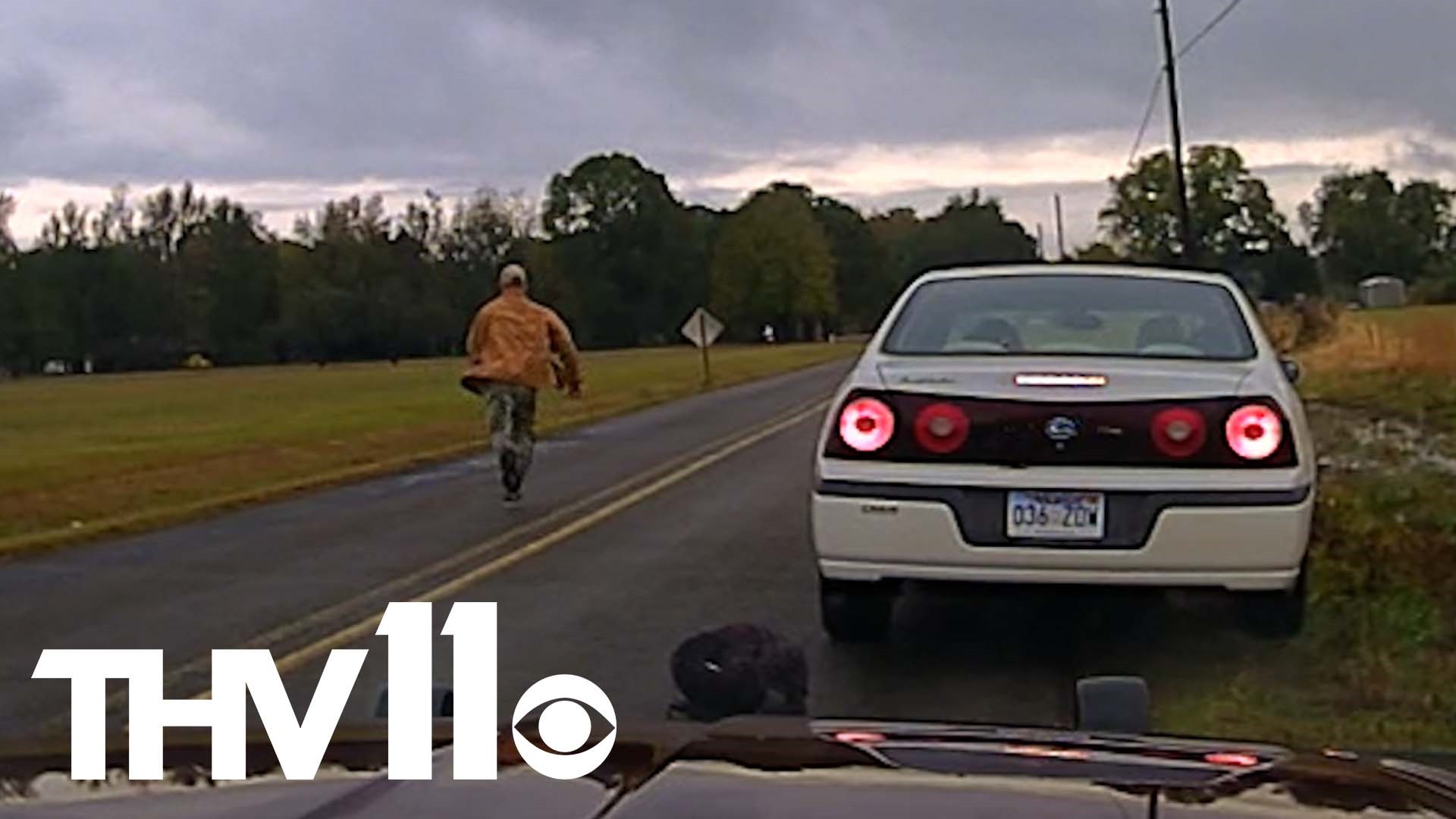 The unknown man, who is being dubbed as Pottsville Forrest Gump, ran into the distance as the driver was being pulled over and given a warning.