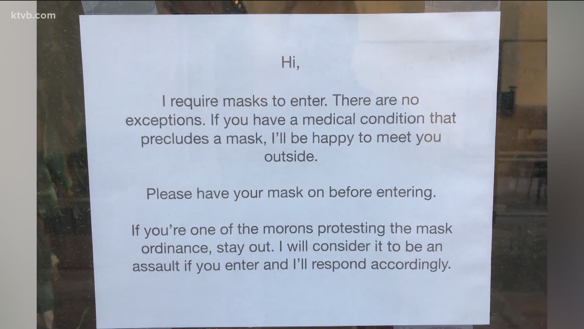 Mike Rogers makes custom jewelry in his shop Precious Metal Arts on 8th Street. He has a message for anti-maskers and its posted on the door to his store.