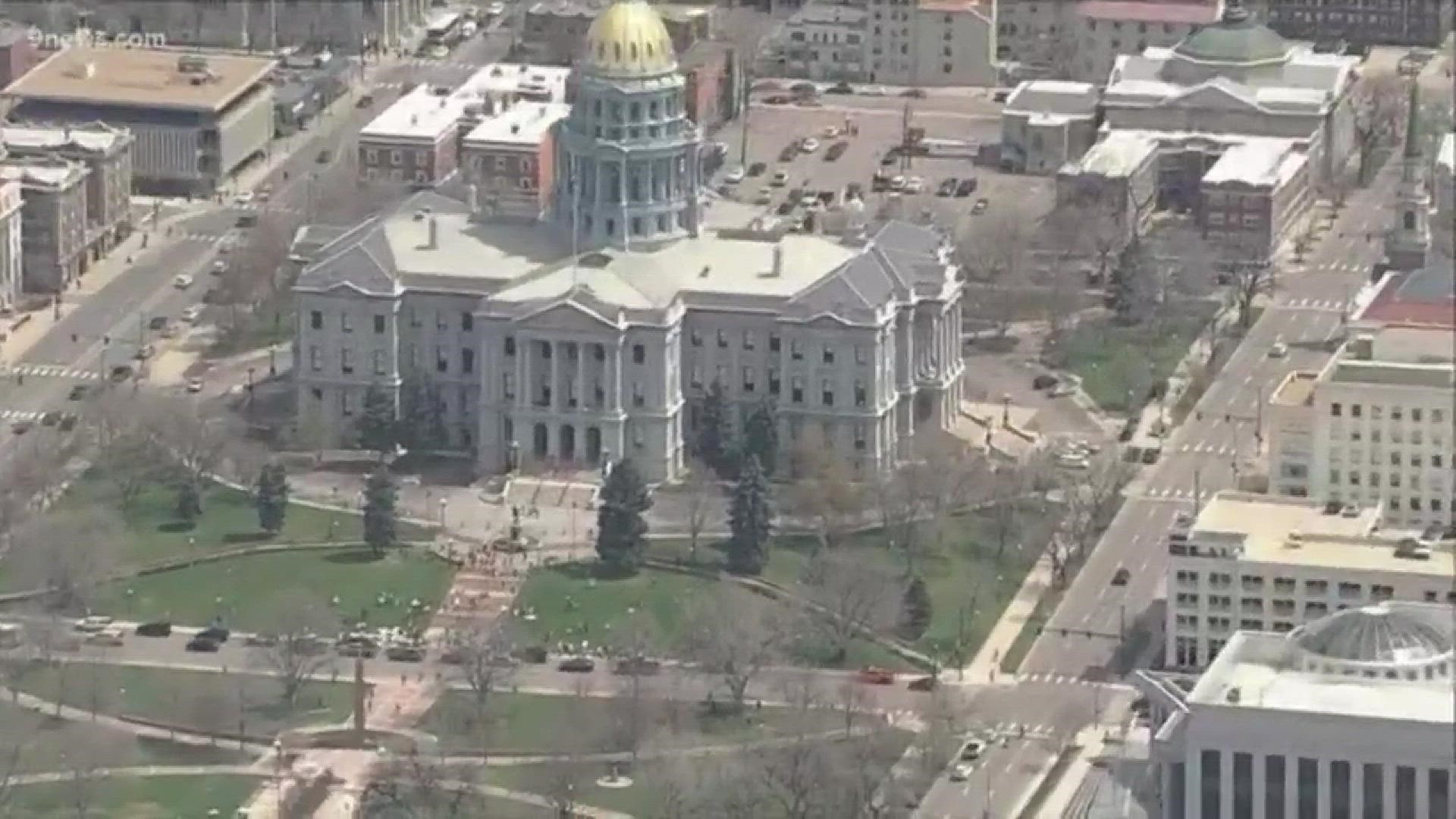 Groups protested Colorado's stay-at-home order outside the State Capitol in Denver on April 19.