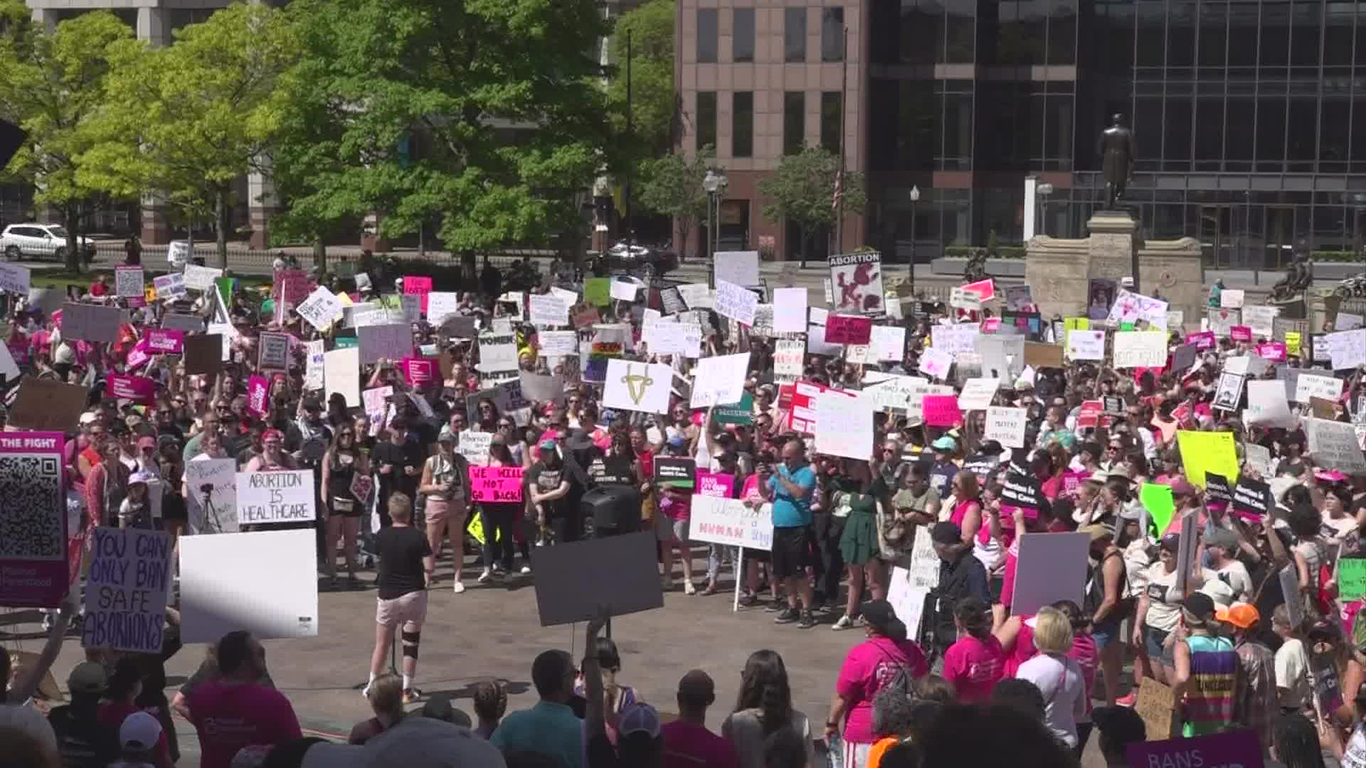Hundreds of abortion-rights and anti-abortion activists filled the lawn of the Ohio Statehouse Saturday afternoon.
