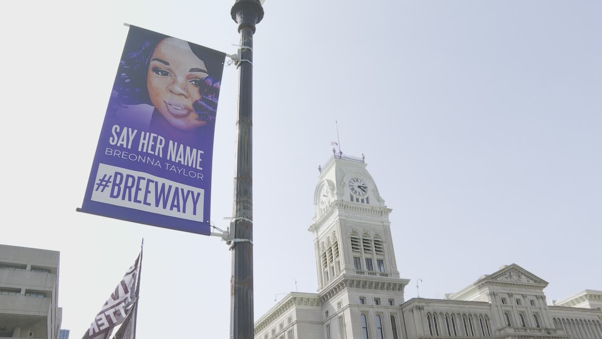 The executive director of the Louisville Downtown Partnership, which controls banners, said they do not plan to take them down.