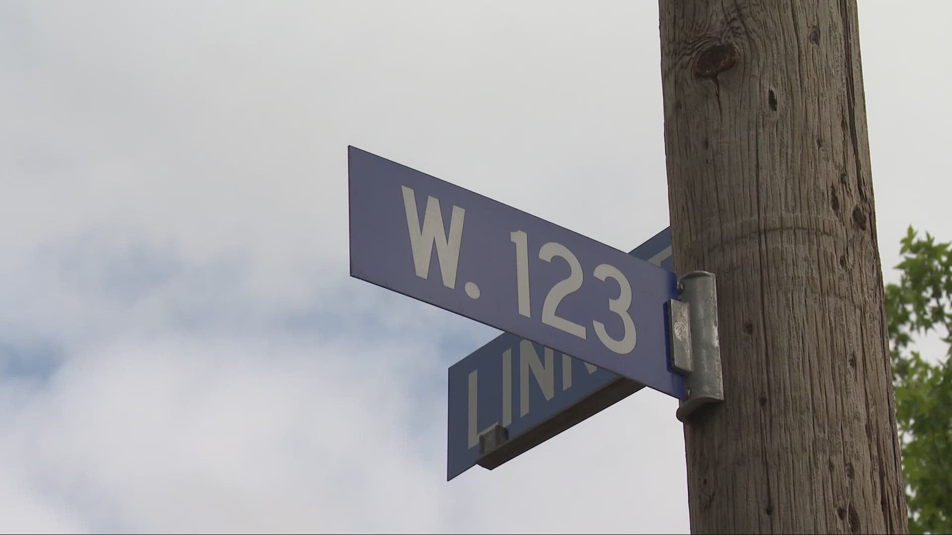 Cleveland police are searching for two suspects after an off-duty officer was slashed in the head with a screwdriver during an aggravated robbery over the weekend.