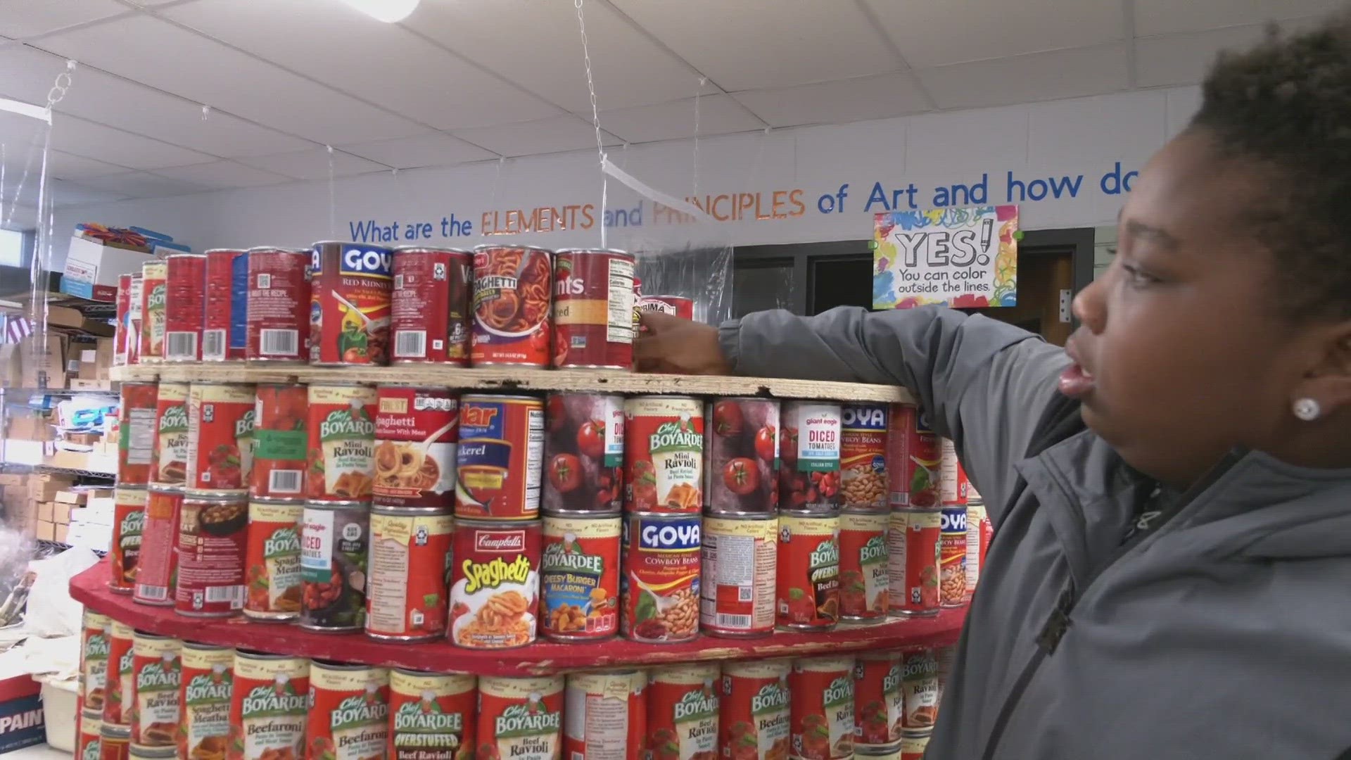 Canton middle school students made canned goods sculptures to learn about math and giving back.