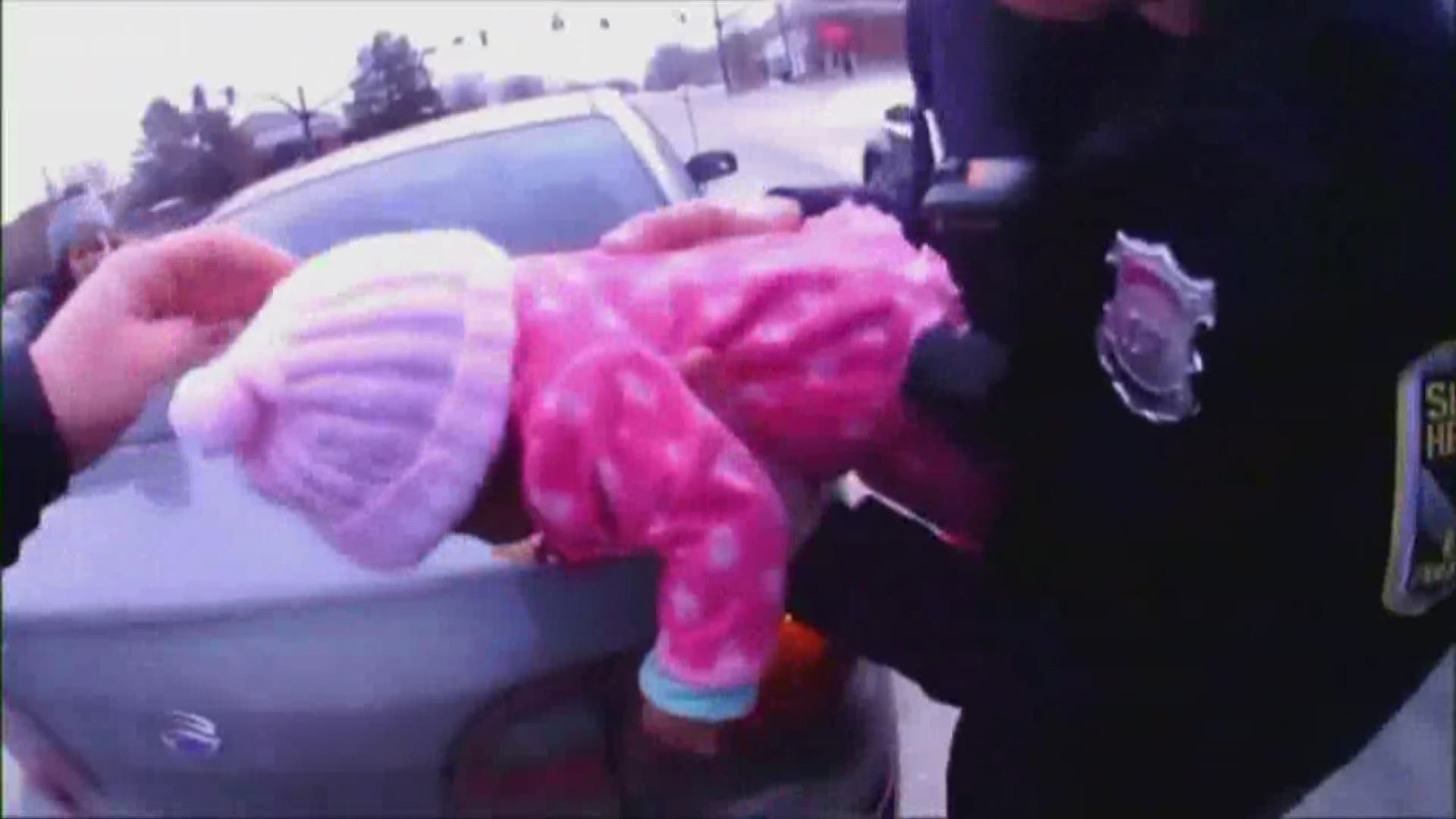 Shaker Heights police officers standing in traffic save choking infant