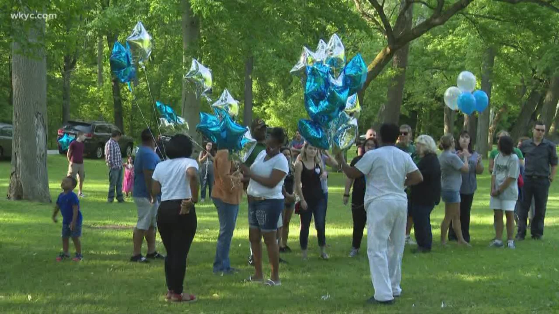 Loved ones hold vigil to remember two found dead in Fairview Park