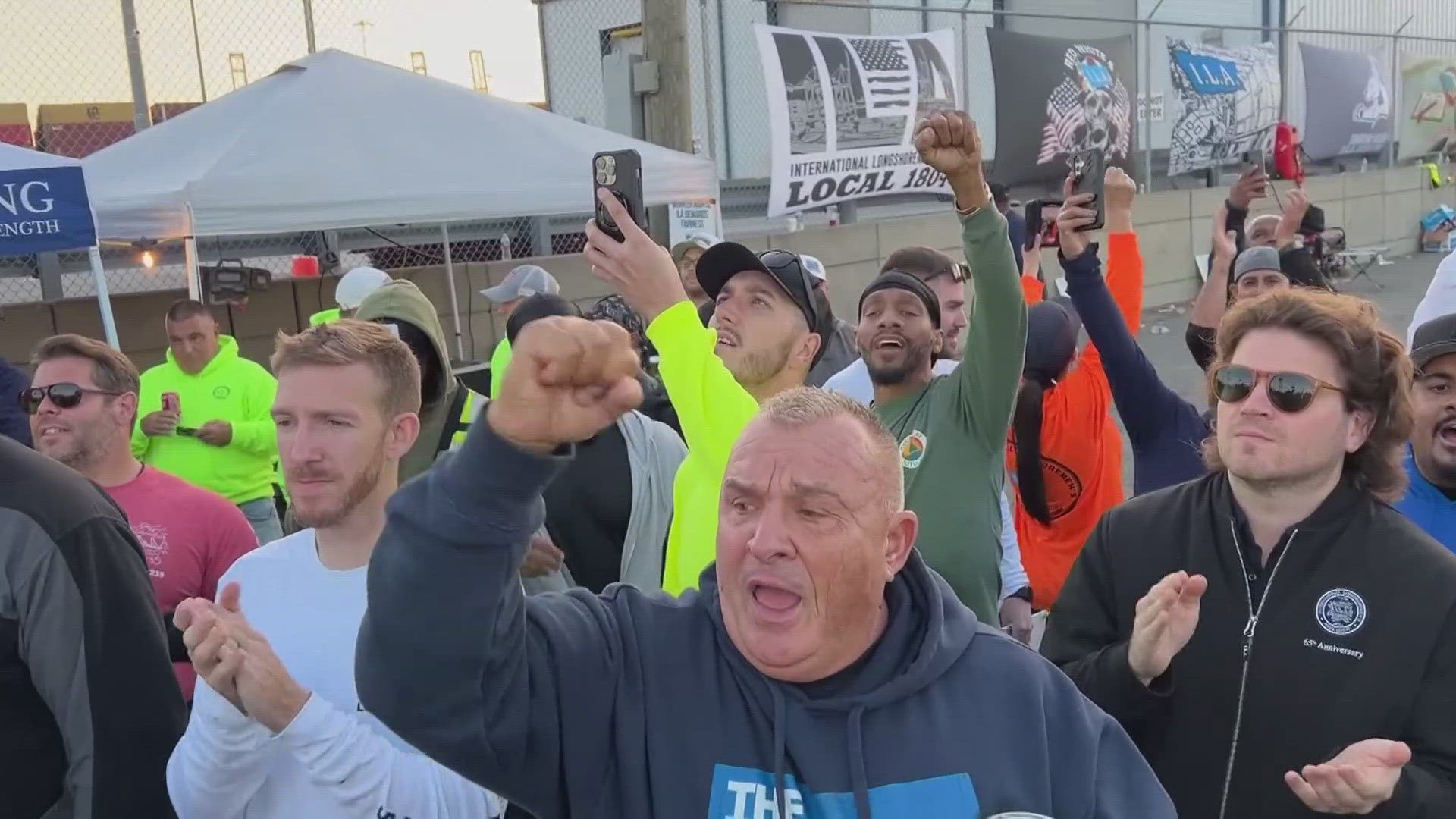 The union representing 45,000 striking U.S. dockworkers at East and Gulf coast ports reached a deal to suspend a three-day strike until Jan. 15.