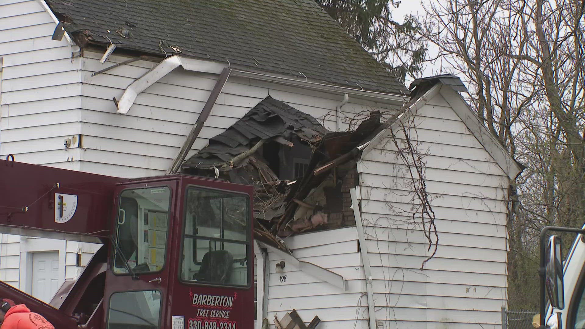 1 person dead after tree falls on house in Barberton | wkyc.com