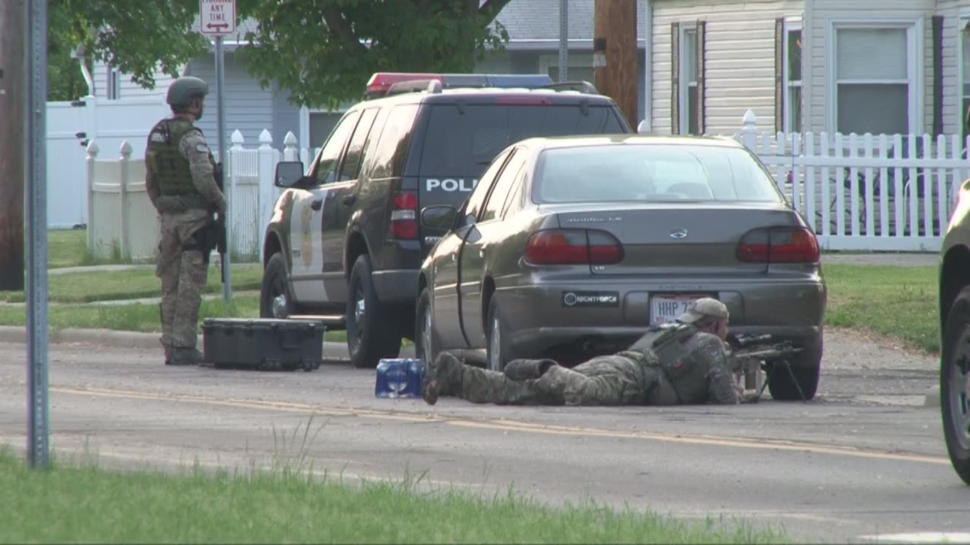 Neighbors react after Amherst police officer shot in standoff