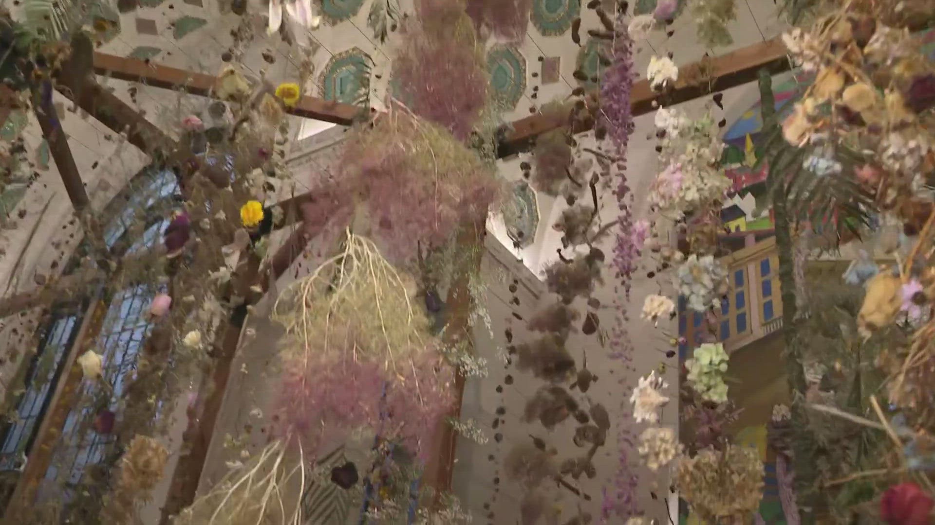 The floral immersive exhibit is by British artist Rebecca Louise Law.