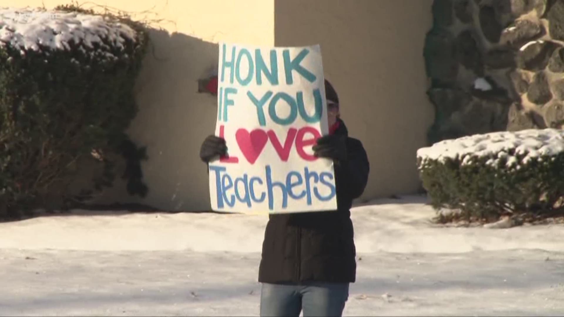 Feb. 19, 2019: A group of teachers with Summit Academy Parma began walking the picket line outside the school on Stumph Road today.