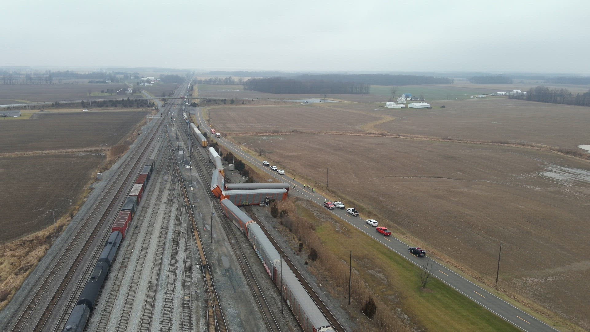 The derailment knocked two 1,000 gallon tanks of propane off their pedestal near the tracks.