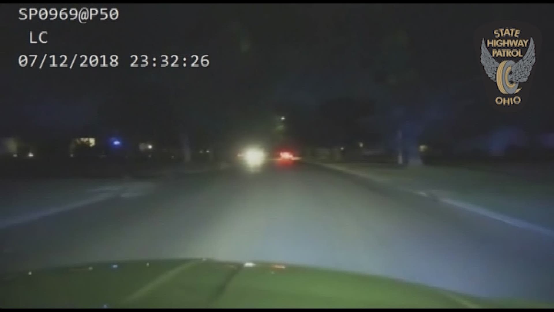July 12, 2018: Dashcam video shows the moment an Ohio State trooper was dragged by a vehicle after the suspect fled a traffic stop.