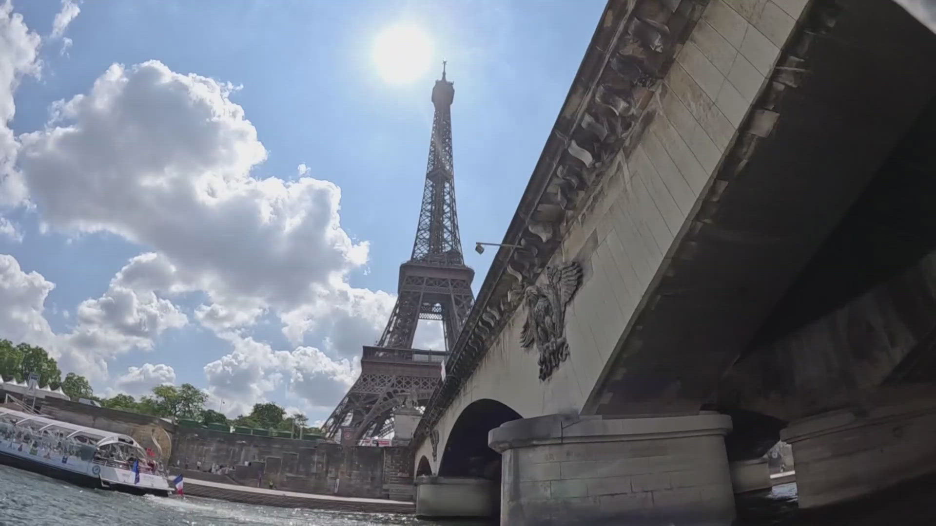 Matt Rascon learns more about a company using the first-ever electric boats on the River Seine during the Opening Ceremony.