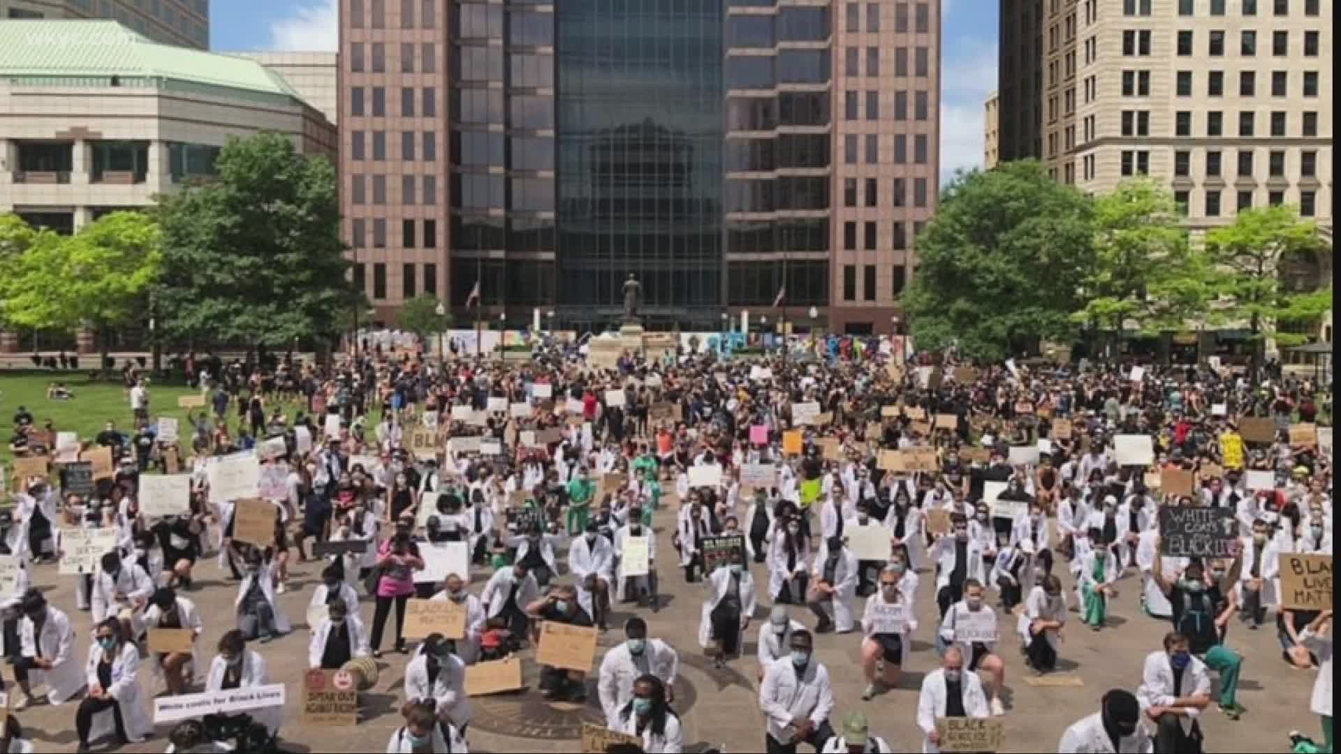 The White Coats for Black Lives observance is a symbol of "unity in the commitment to change." Laura Caso reports.