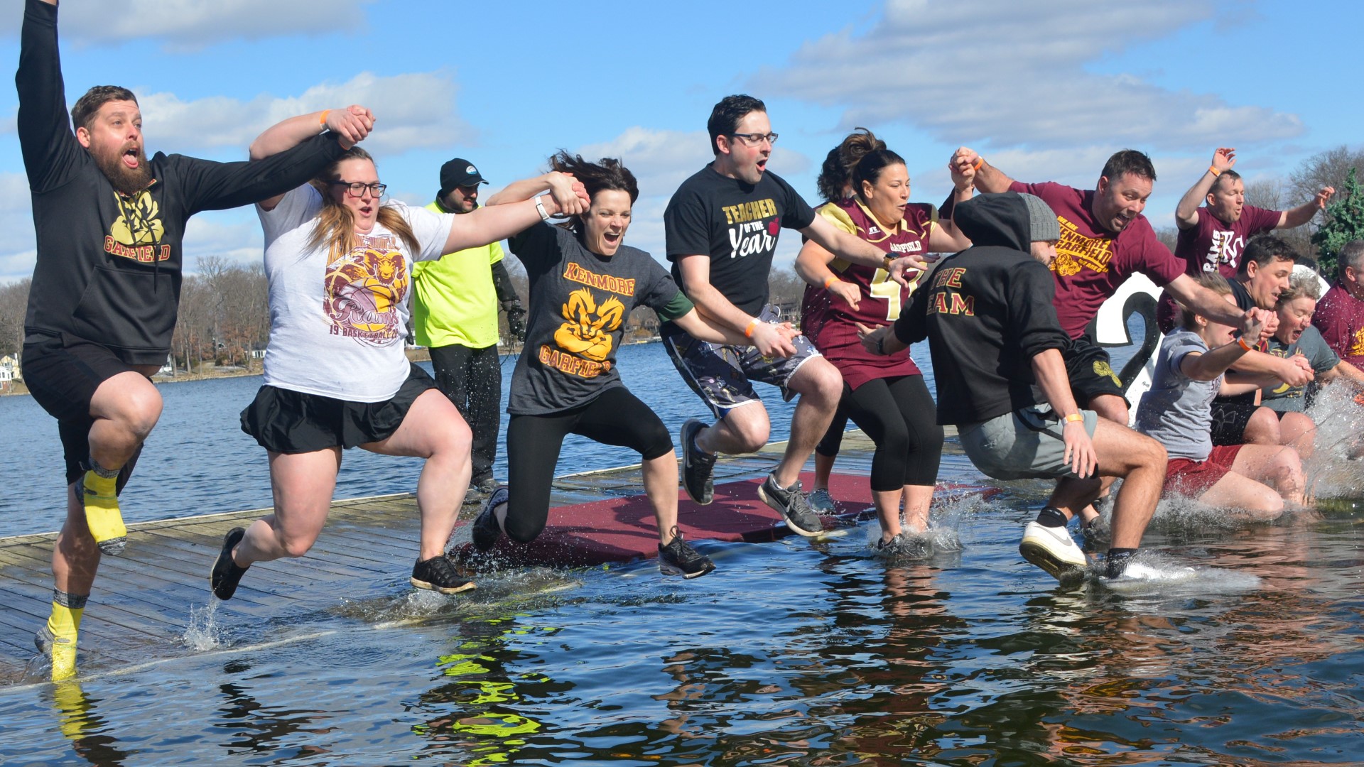 Although it was a bitterly cold afternoon, more than 750 people packed the beach at Portage Lakes State Park to go for a swim. $170,000+ was raised for charity.