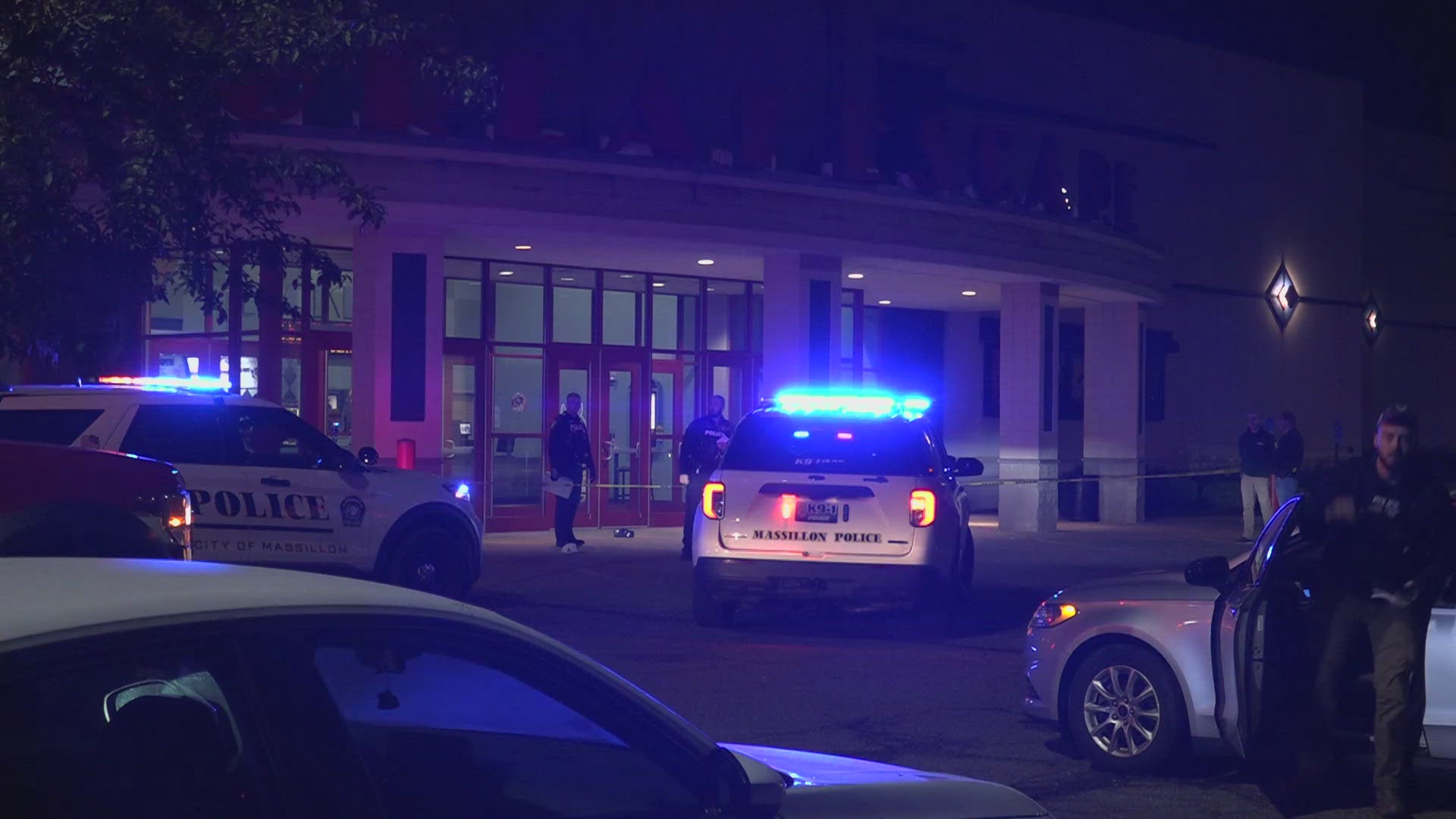 Eyewitnesses told 3News the shooting took place in the lobby of the theater. Police could later be seen escorting people from the building.