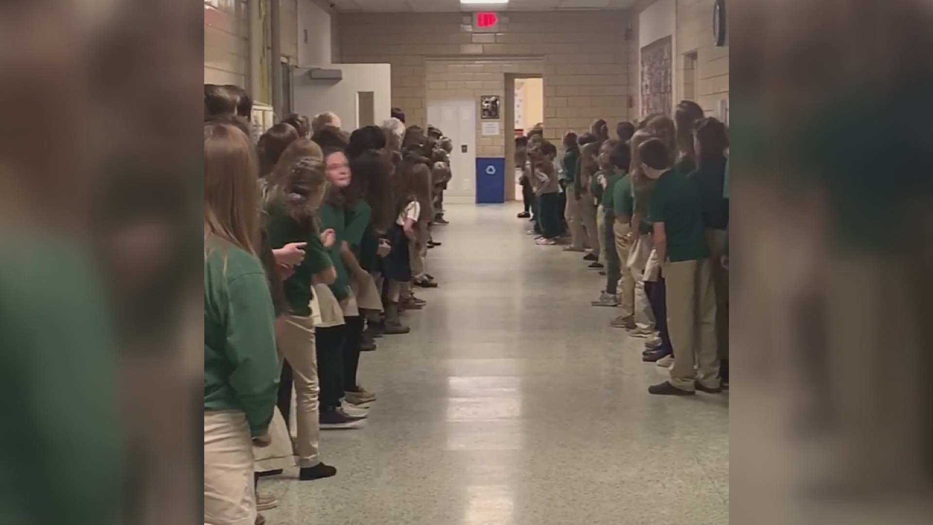 St. Helen's Catholic School in Newbury gave 6-year-old John Oliver Zippay a standing ovation after his last chemo treatment. (Courtesy Megan Zippay)
