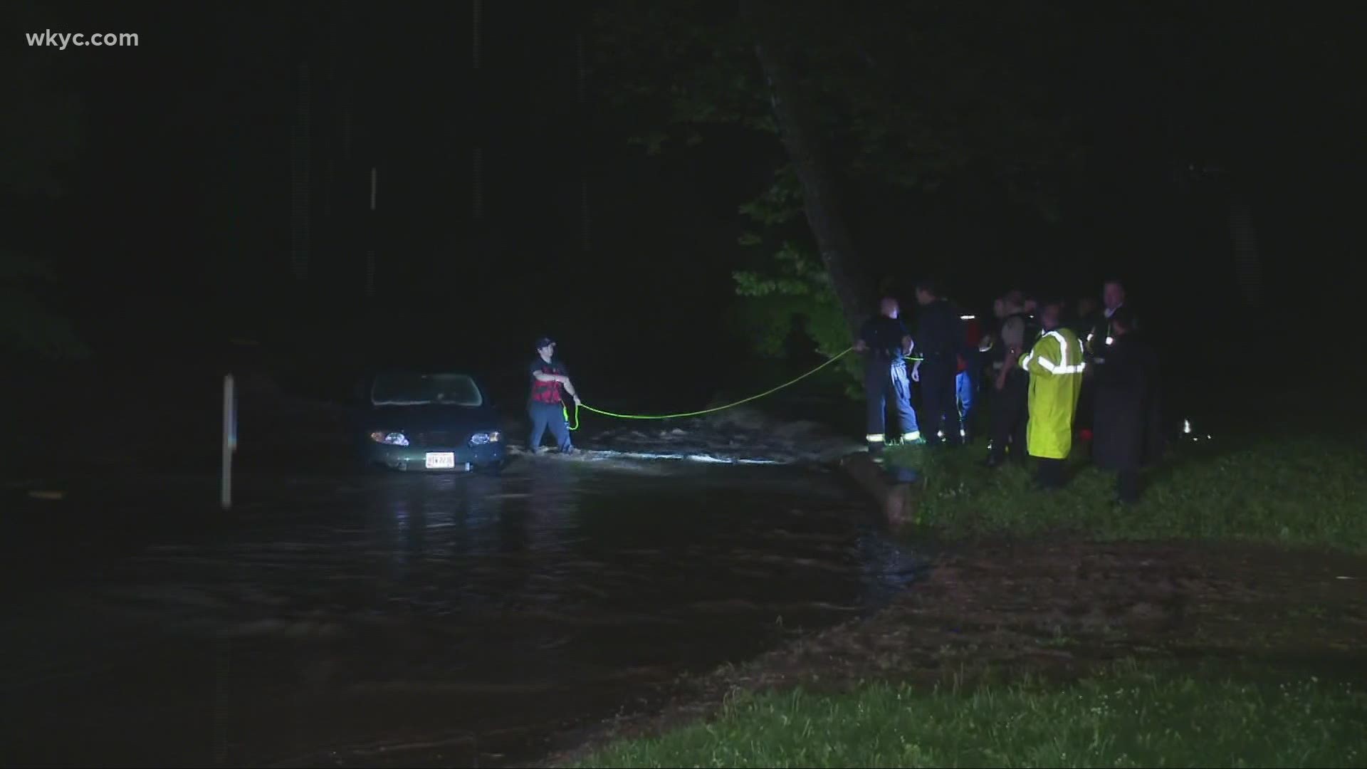 Police say the vehicle drove through flood waters before crashing.