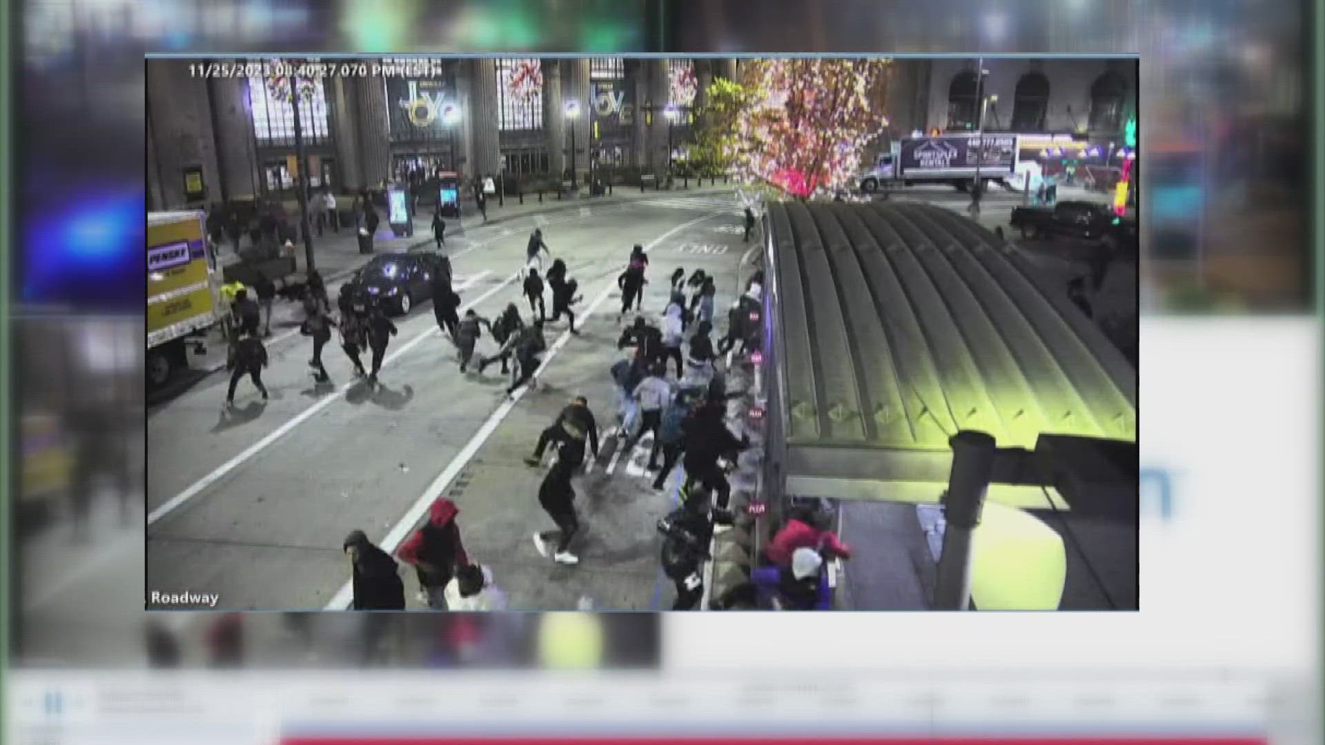 The footage, released by the RTA, shows those assembled scattering as shots were fired. Two teens were taken to the hospital for their injuries.