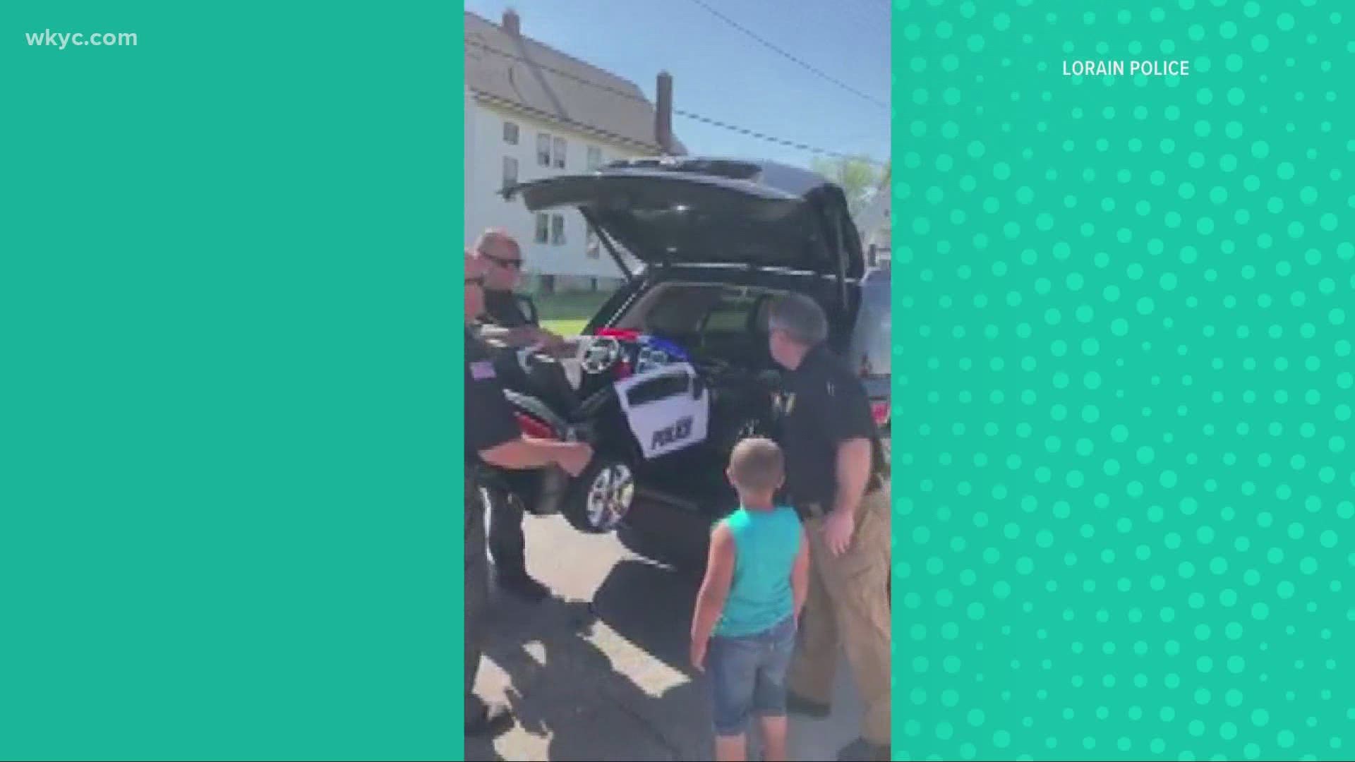 Lorain's police chief found out that 3-year-old Braylin's toy police car was destroyed by a tree during a storm. So he and his officers jumped into action.