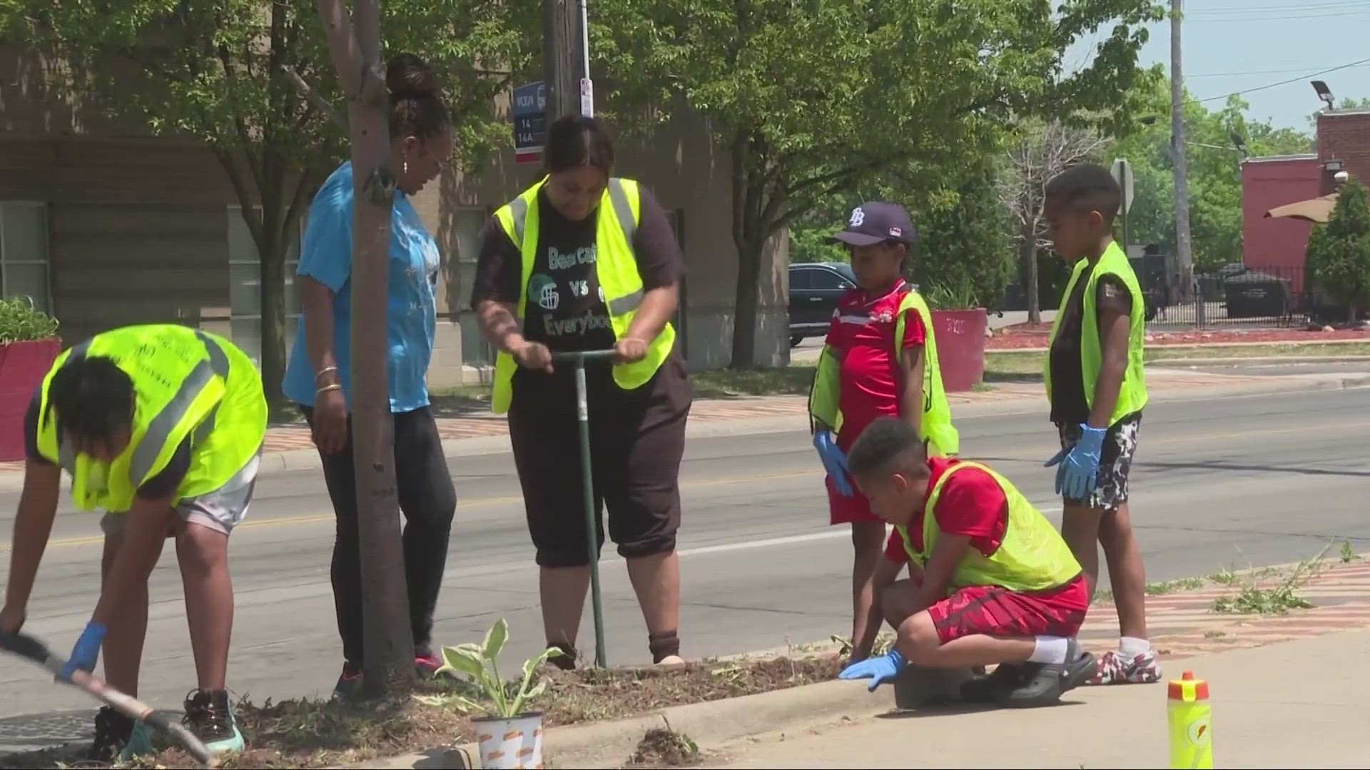 'Clean & Beautiful Cleveland' pulled weeds, picked up trash, planted trees and flowers, and put down mulch on Saturday.