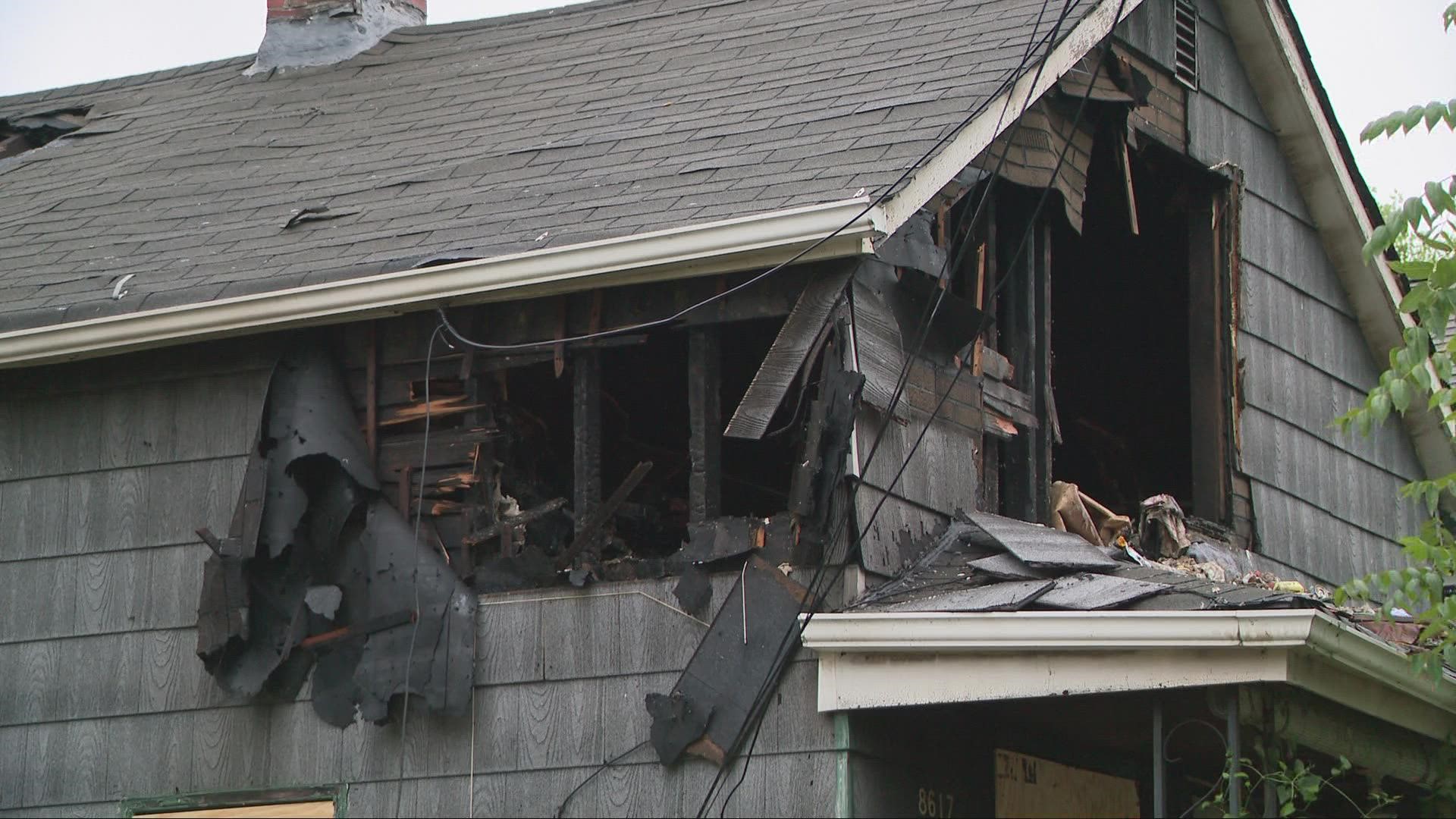 Fire officials say the 68-year-old woman was found upstairs