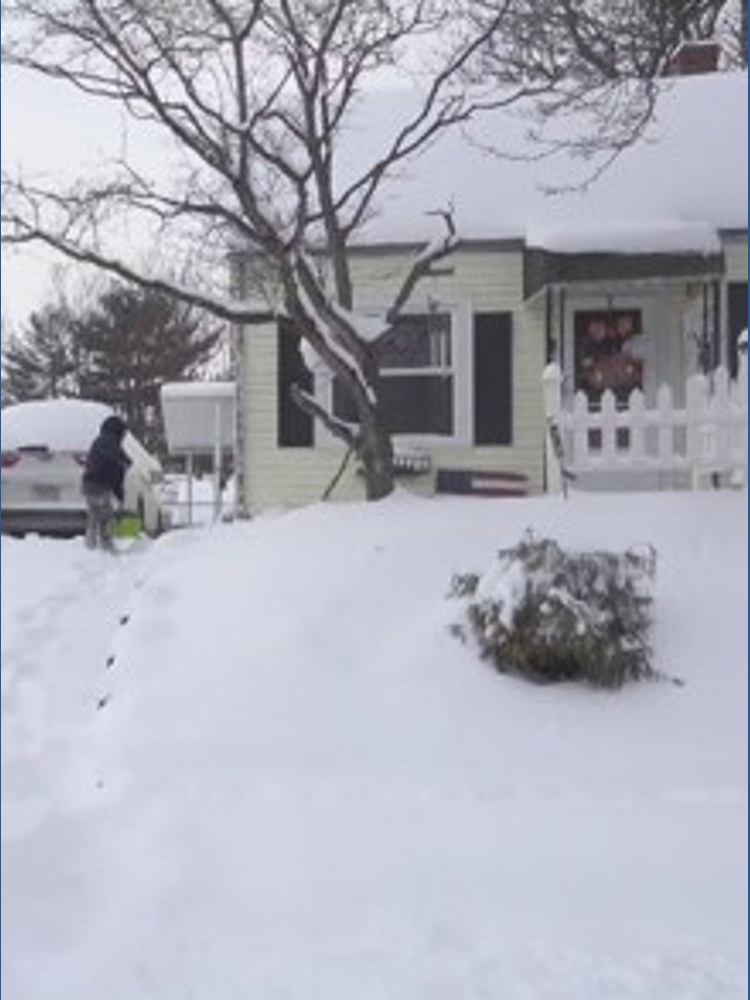 Wooster football team trades weight room for shovels on snow day
