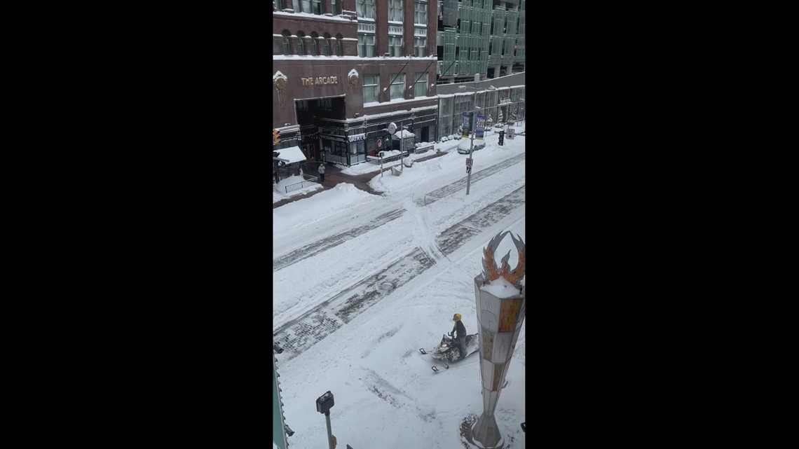 Snowmobile travels on Euclid Ave. in downtown Cleveland (Credit: Amy Ziemak)