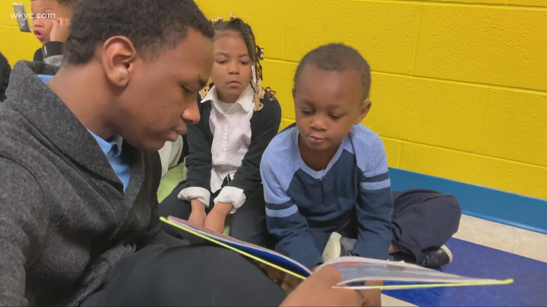 The volunteer-driven effort helps 2nd- and 3rd-graders at Cleveland's Charles Dickens School develop reading proficiency. The program is spearheaded by WKYC Studios.
