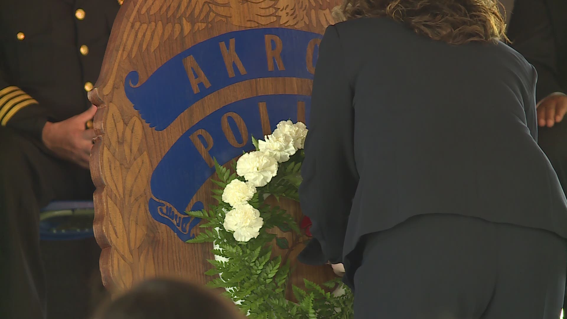 Akron police and community members honored 26 fallen officers at a memorial at the Akron FOP lodge late Wednesday morning.