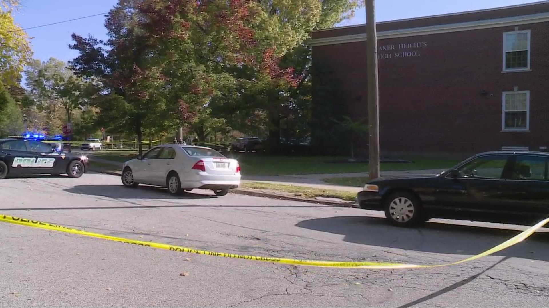 Authorities say the suspect fled and was seen with a gun before being shot and taken to the hospital. No classes were in session but school staff were evacuated.