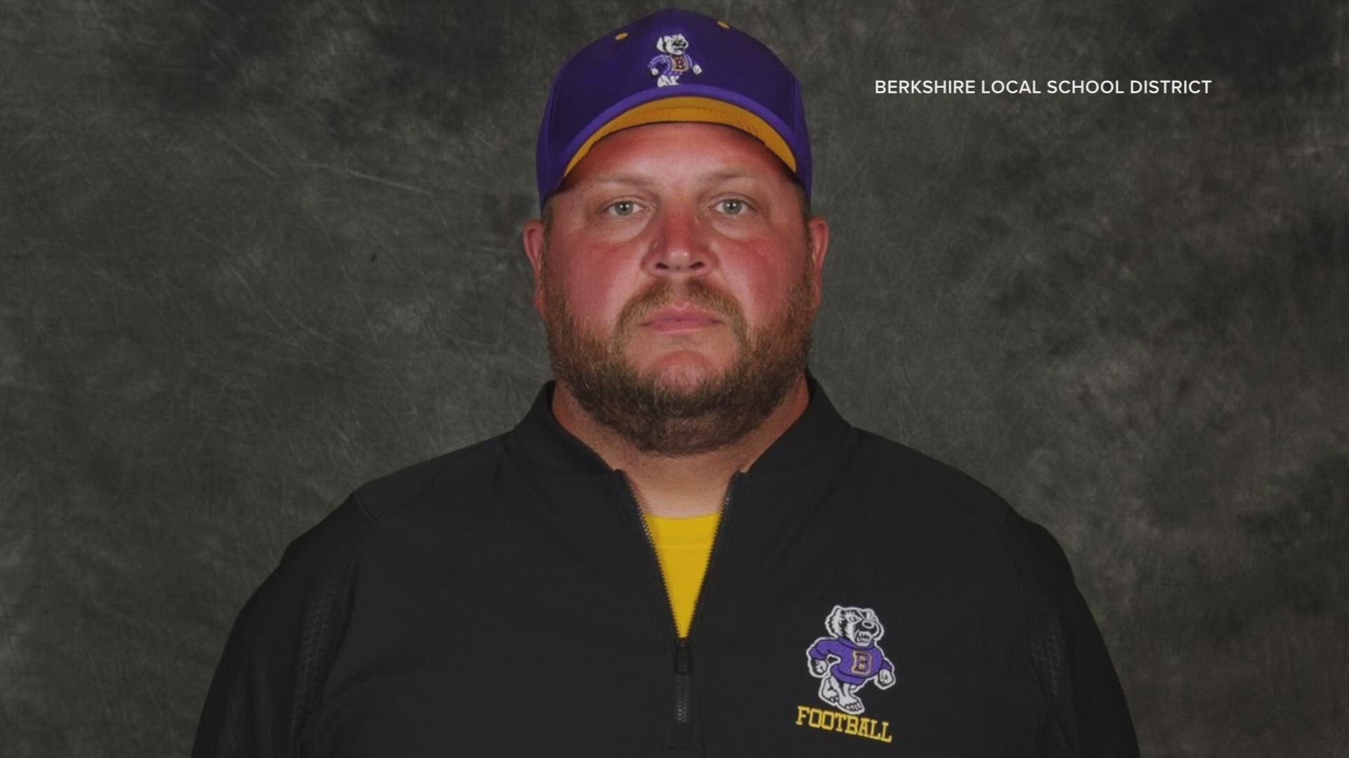 Burzanko, who is also an assistant football coach at the high school, is accused of sending a lewd photo to a student.