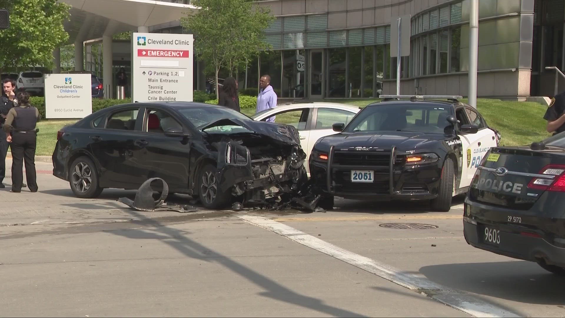 A Cleveland Clinic officer was injured after the driver of a suspected stolen vehicle crashed into a hospital police car on Wednesday afternoon.