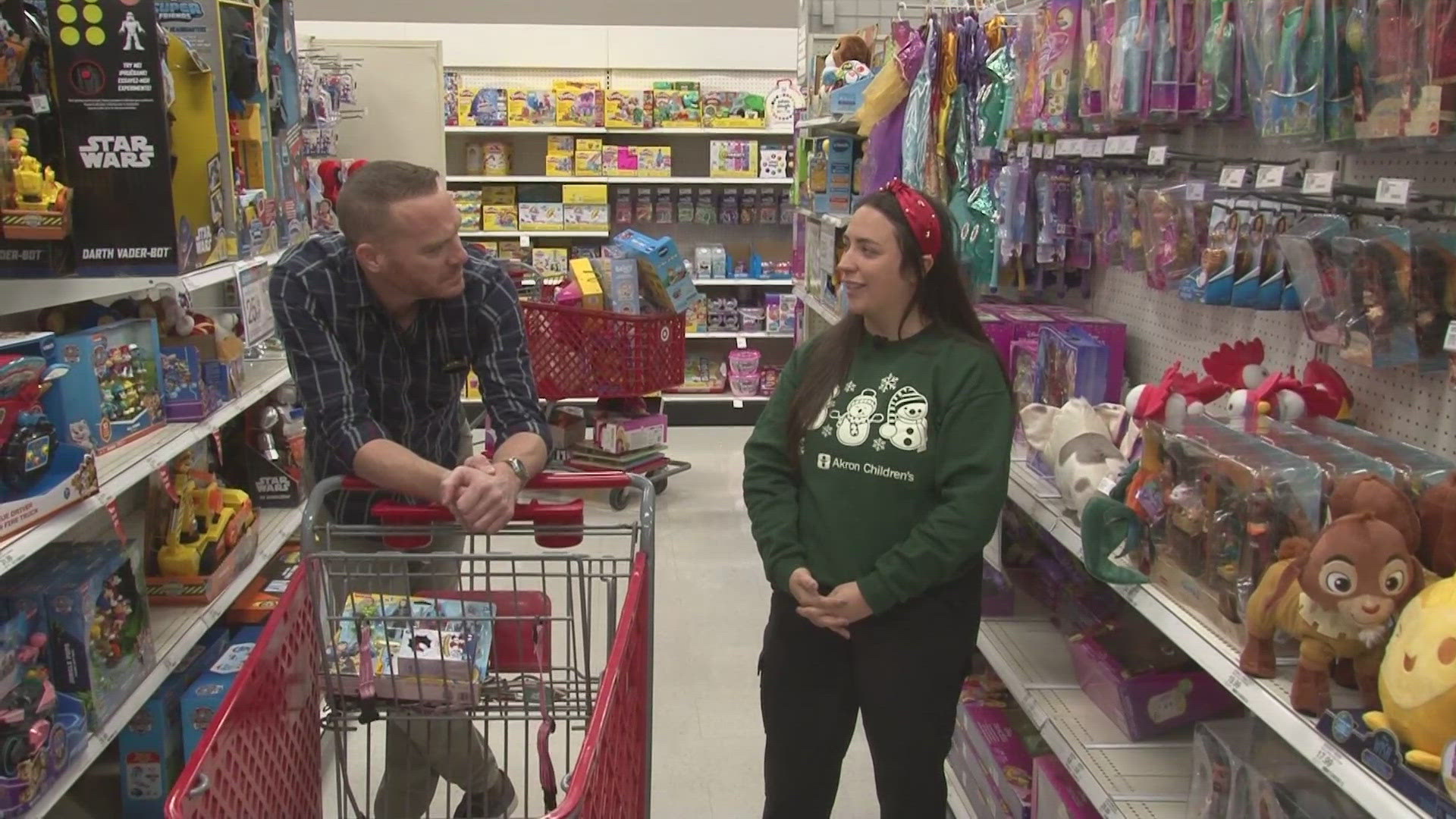 3News' Stephanie Haney and Mike Polk Jr. emceed the event at Target in Fairlawn and helped select toys that children at the hospital will receive on December 23