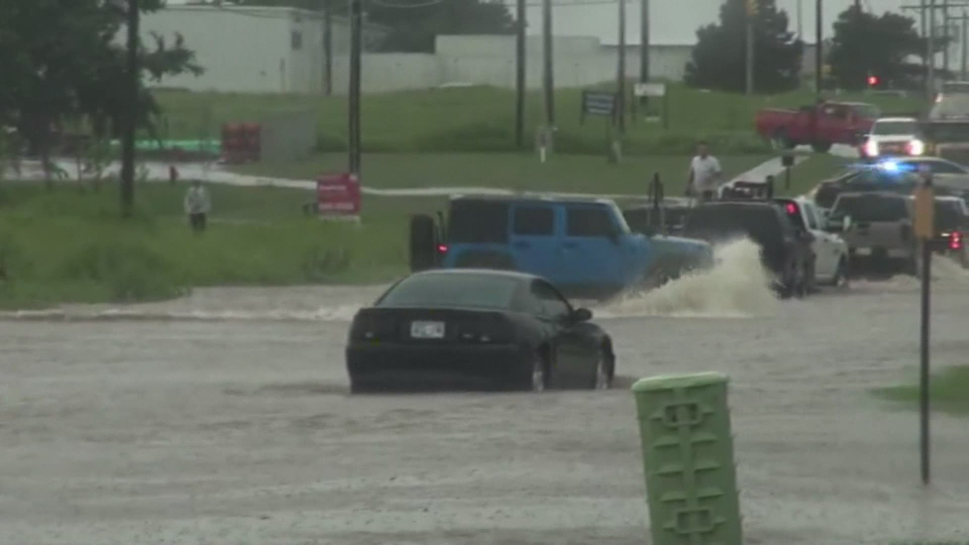 Storm-weary Oklahoma and Arkansas are seeing another round of severe weather that has flooded roadways.