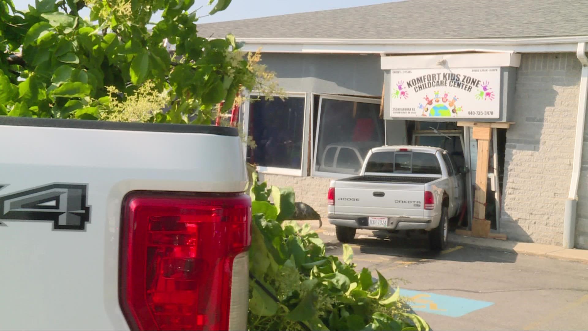 Authorities are investigating after a pickup truck crashed through the front of a child care center in Bedford Heights on Wednesday morning.