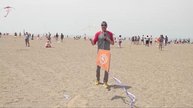 Mike Polk Jr. attempts to help group break a Guinness World Record in kite flying