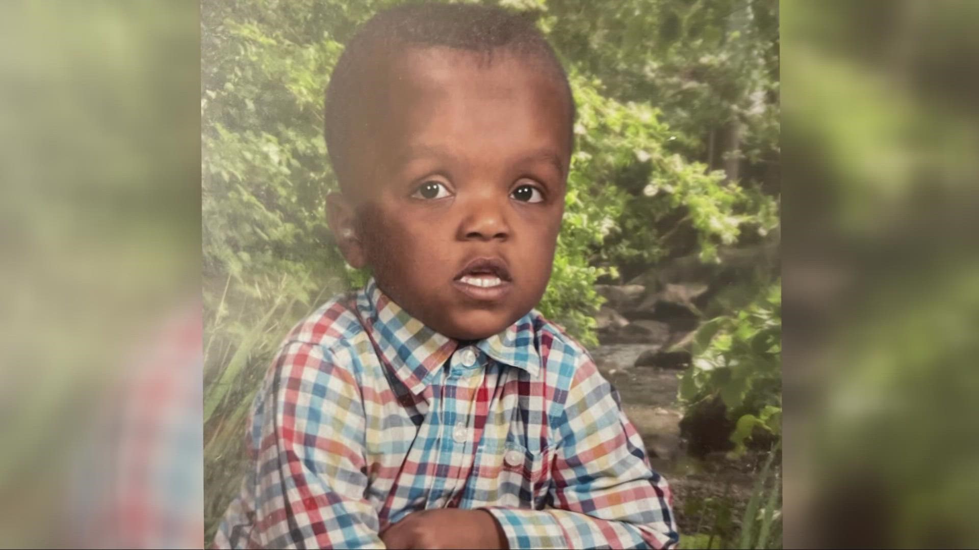 Cayden Williams' uncle claims the child was in an upstairs bedroom when an aunt downstairs shot a gun through the ceiling, striking him in the head.